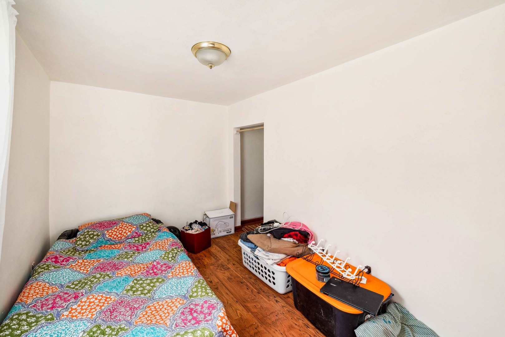 15589 Chicago Road Sandwich, IL 60548 - Photo 10 of 30 a bedroom with bed and a window