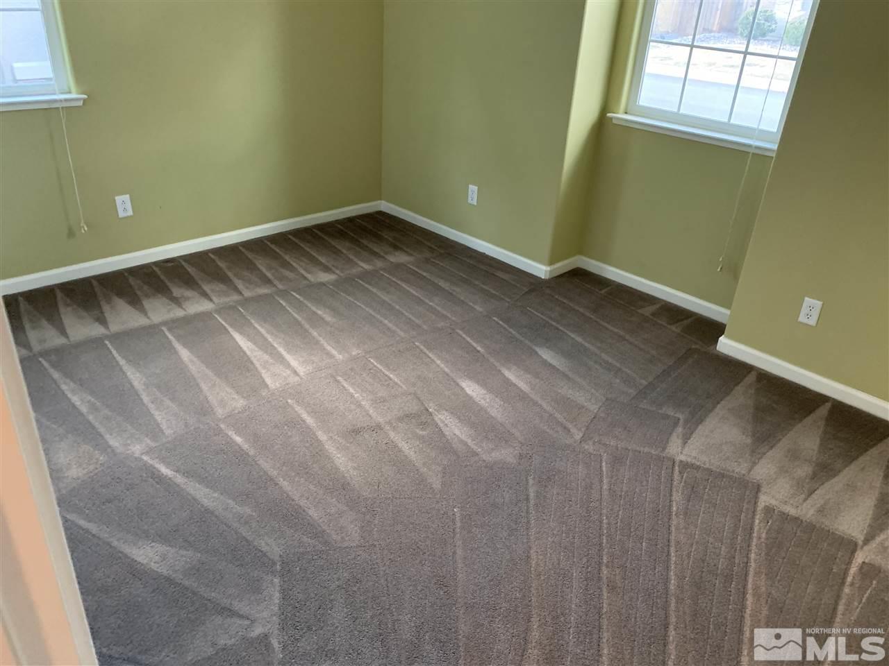 560 Terracina Way Reno, NV 89521 - Photo 23 of 25 a view of a room with wooden floor