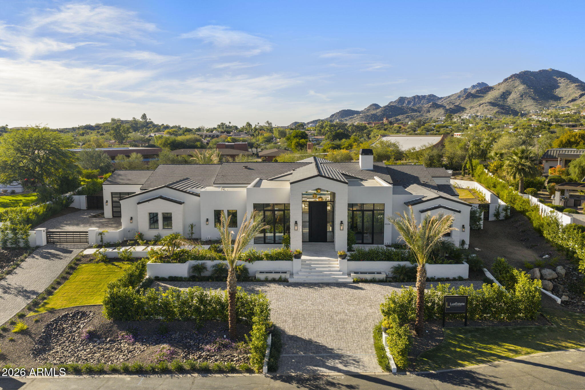 4534 East Pebble Ridge Road Paradise Valley, AZ 85253 - Photo 12 of 12 a view of a town with lawn chairs and large tree