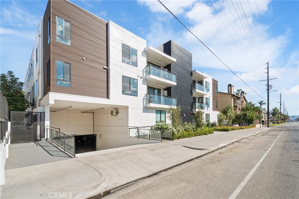 7510 Sepulveda Boulevard, Unit 204 Van Nuys, CA 91405 - Photo 24 of 24 a view of a building with a street