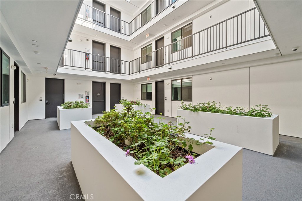 7510 Sepulveda Boulevard, Unit 204 Van Nuys, CA 91405 - Photo 3 of 24 front view of a house with a large window