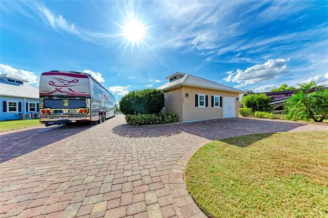 a front view of a building with parking space