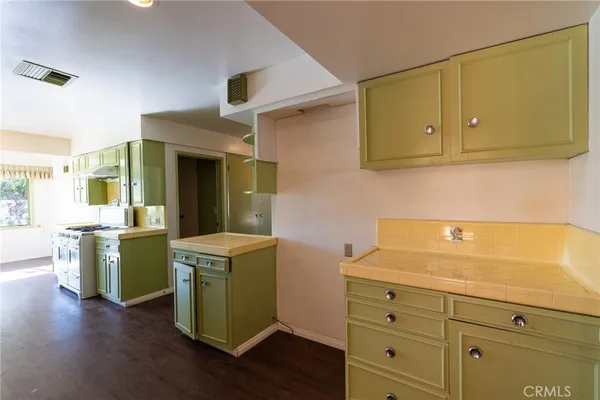 a room with cabinets and a wooden floors