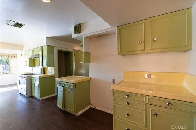 a room with cabinets and a wooden floors