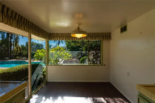 a view of balcony and yard