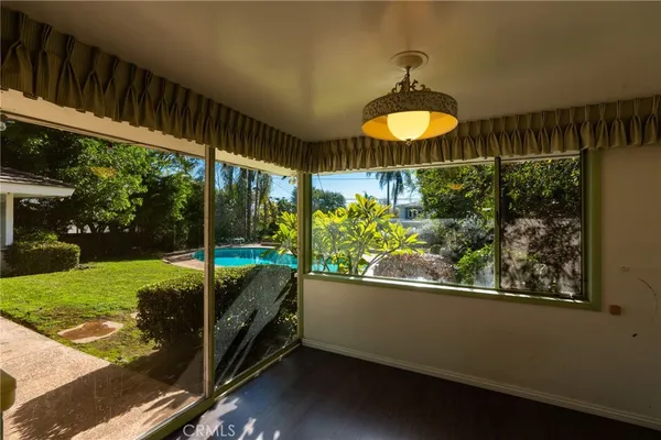 a view of a porch and garden