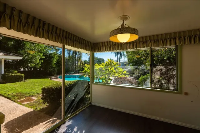 a view of a porch and garden