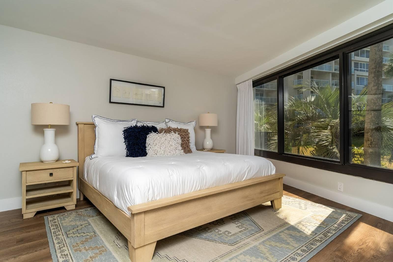 4017 Beachside 1, Unit 4017 Miramar Beach, FL 32550 - Photo 11 of 26 a bedroom with a bed and window