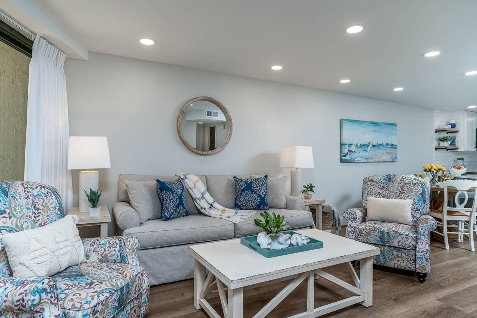 4017 Beachside 1, Unit 4017 Miramar Beach, FL 32550 - Photo 2 of 26 a living room with furniture and a table