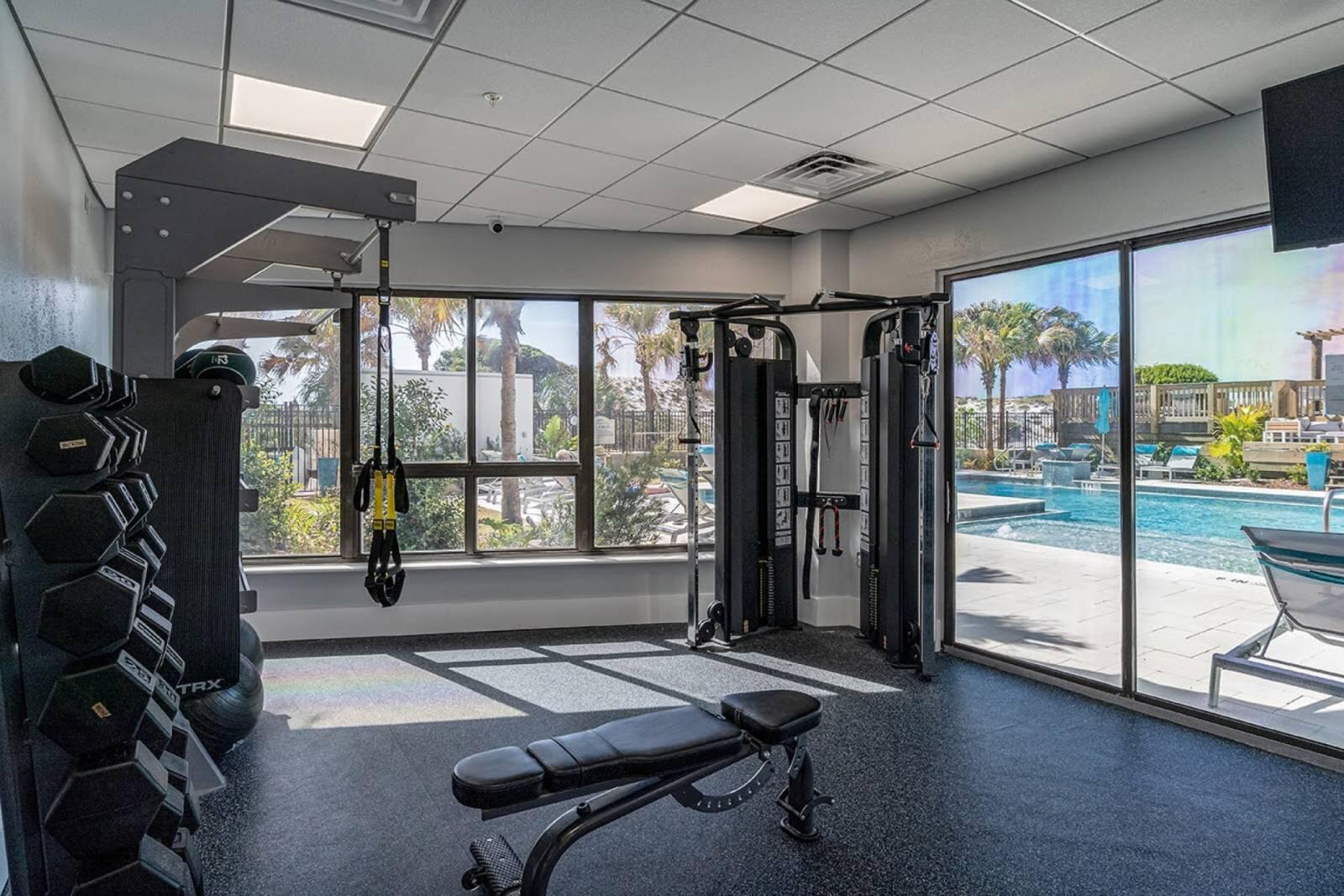 4017 Beachside 1, Unit 4017 Miramar Beach, FL 32550 - Photo 25 of 26 a room with gym equipment and a large window