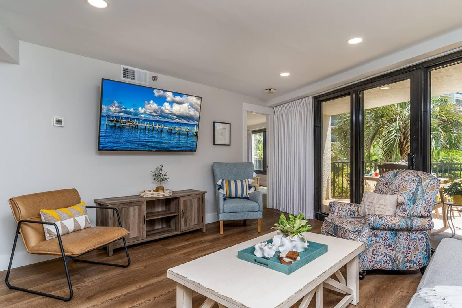 4017 Beachside 1, Unit 4017 Miramar Beach, FL 32550 - Photo 4 of 26 a living room with furniture and a table