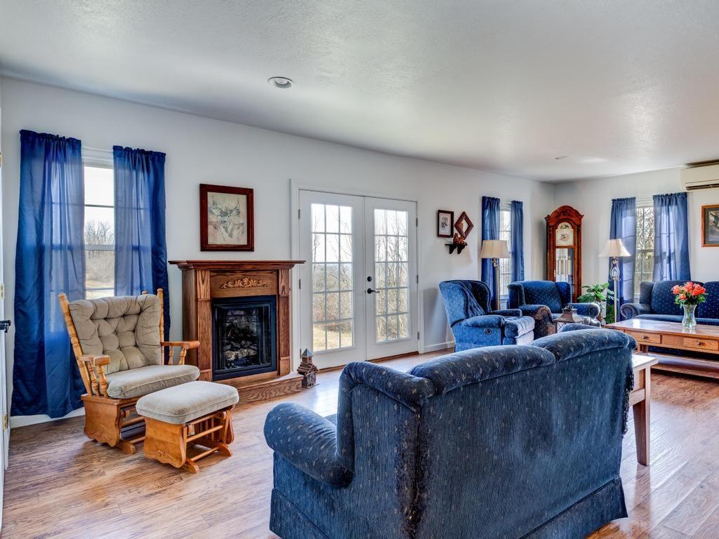 105 Tate Road Hookstown, PA 15050 - Photo 12 of 25 a living room with furniture flat screen tv and a fireplace