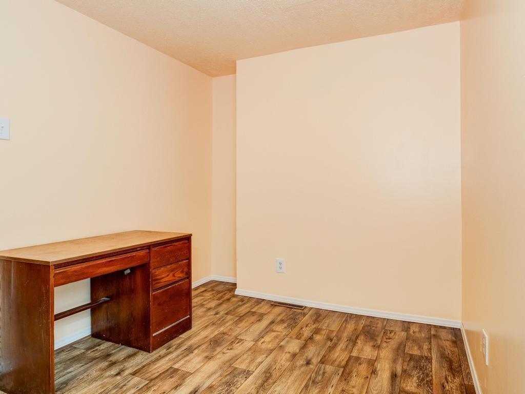 105 Tate Road Hookstown, PA 15050 - Photo 19 of 25 a room with a bed and a dresser