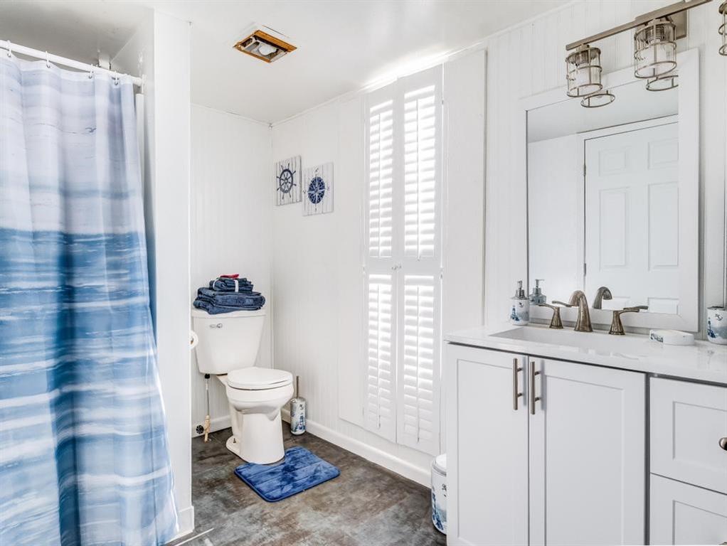105 Tate Road Hookstown, PA 15050 - Photo 20 of 25 a bathroom with a sink toilet and a mirror