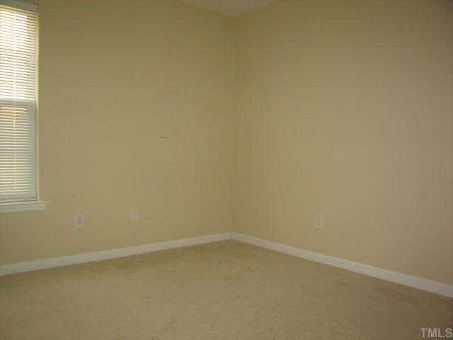 5948 Osprey Cove Drive Raleigh, NC 27604 - Photo 8 of 12 a view of an empty room