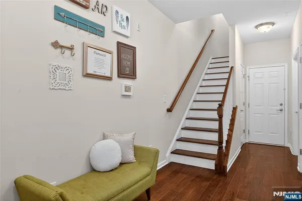 a view of livingroom with furniture and stairs