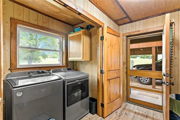a utility room with dryer and washer