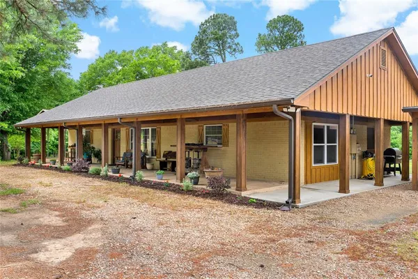 a house with yard in front of it