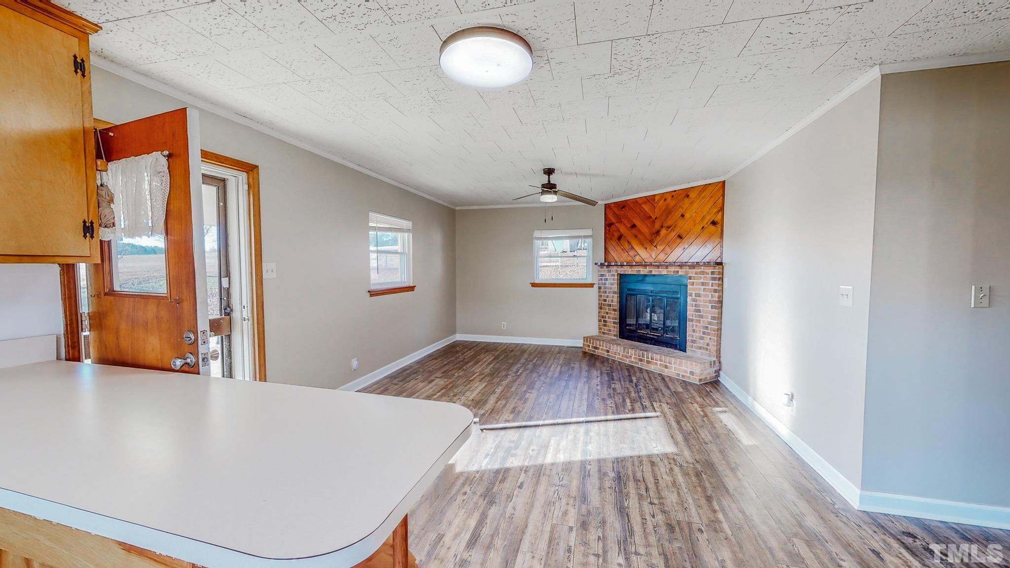 3772 Mt Harmony Church Road Rougemont, NC 27572 - Photo 19 of 66 a view of empty room with wooden floor