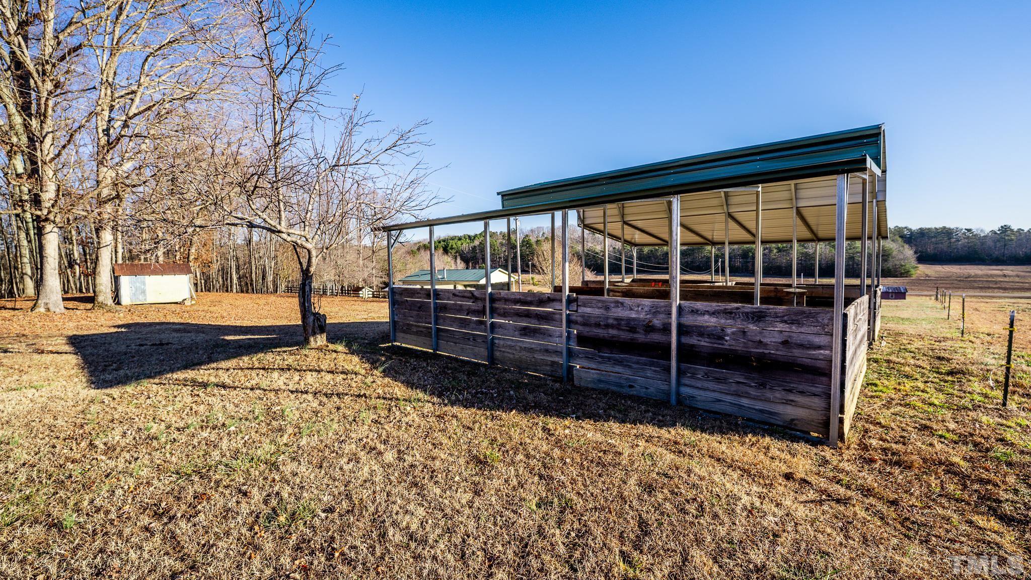 3772 Mt Harmony Church Road Rougemont, NC 27572 - Photo 47 of 66 a view of a backyard with wooden fence