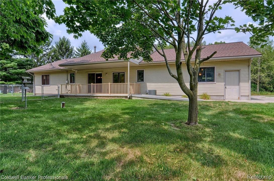 25452 Johns Road South Lyon, MI 48178 - Photo 26 of 34 026-Rear_2nd_View.jpg