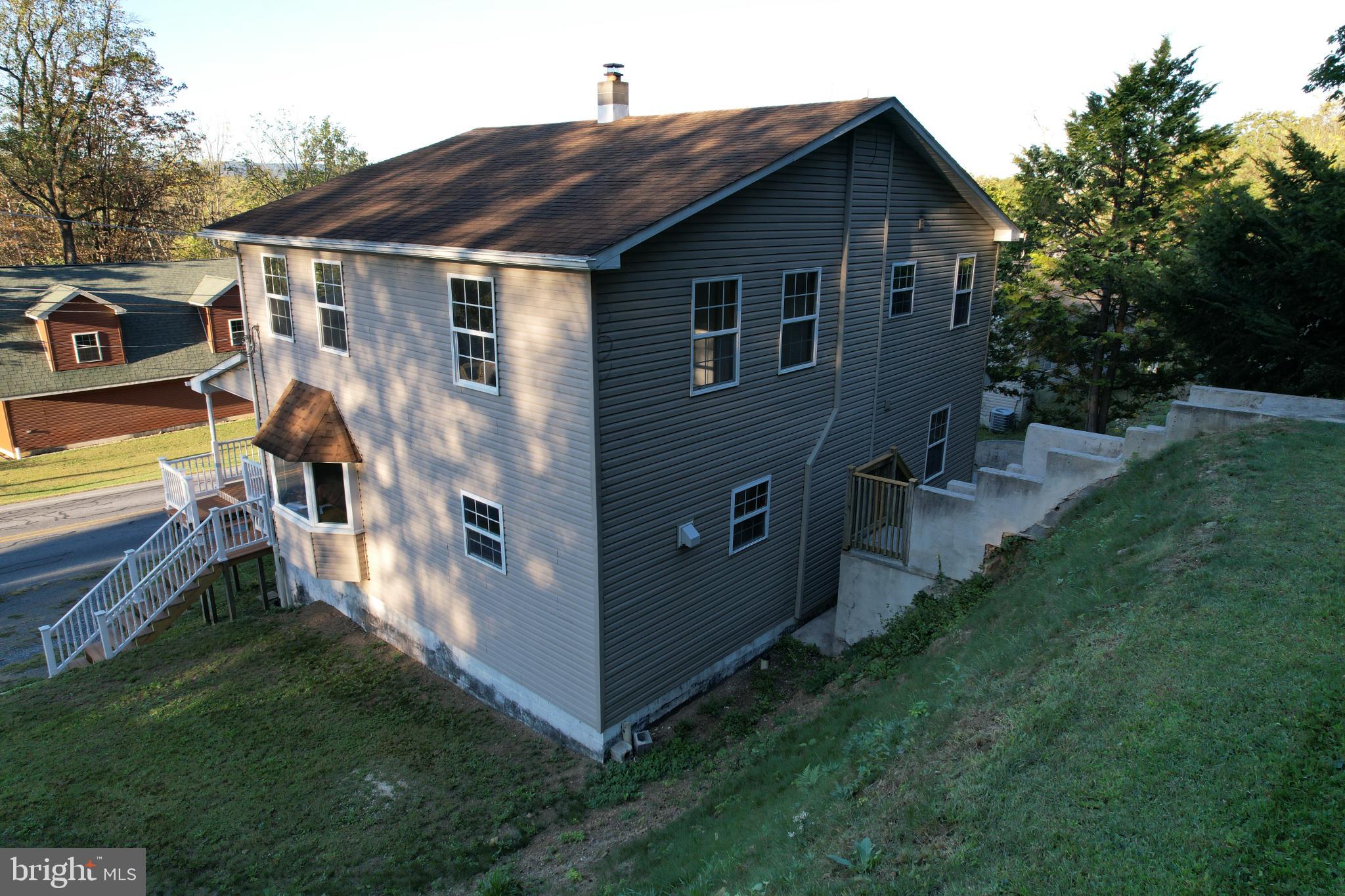 Charming hillside home with scenic views.