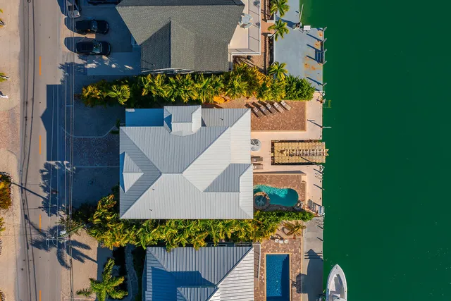 a kitchen with stainless steel appliances granite countertop a sink and stove