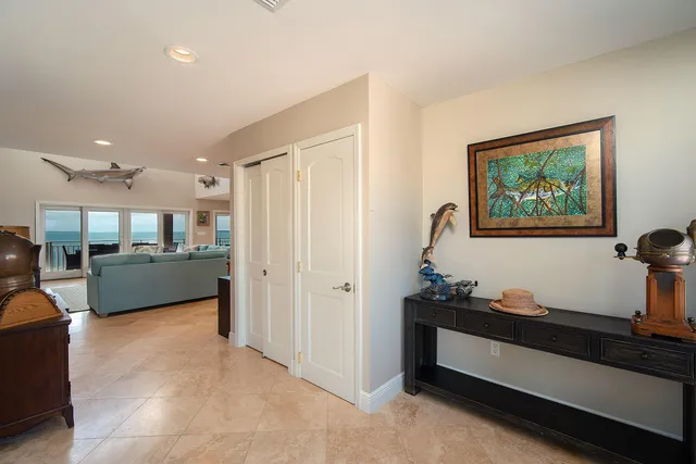 a view of a patio with a table and chairs