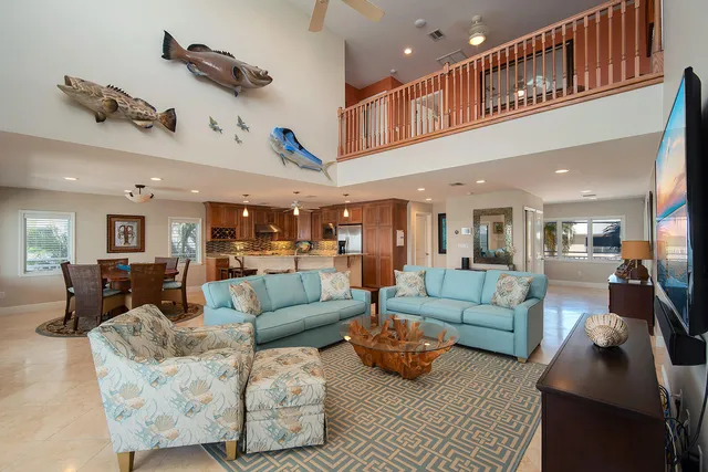 a bedroom with a bed next to a window