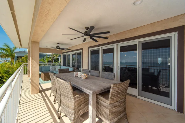 a view of a swimming pool with an outdoor space and seating area