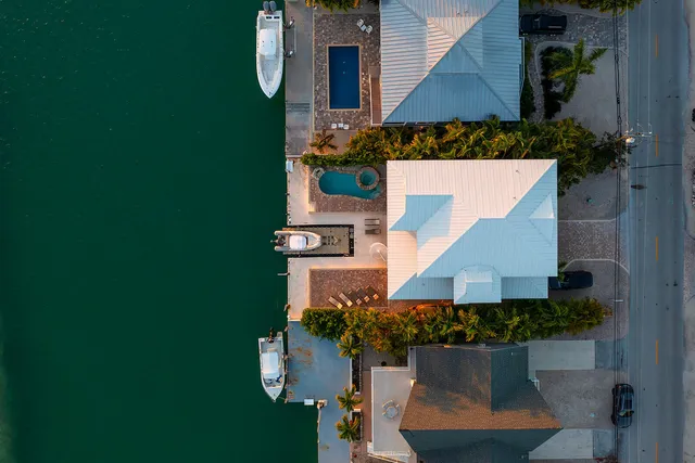 a view of a house with a street