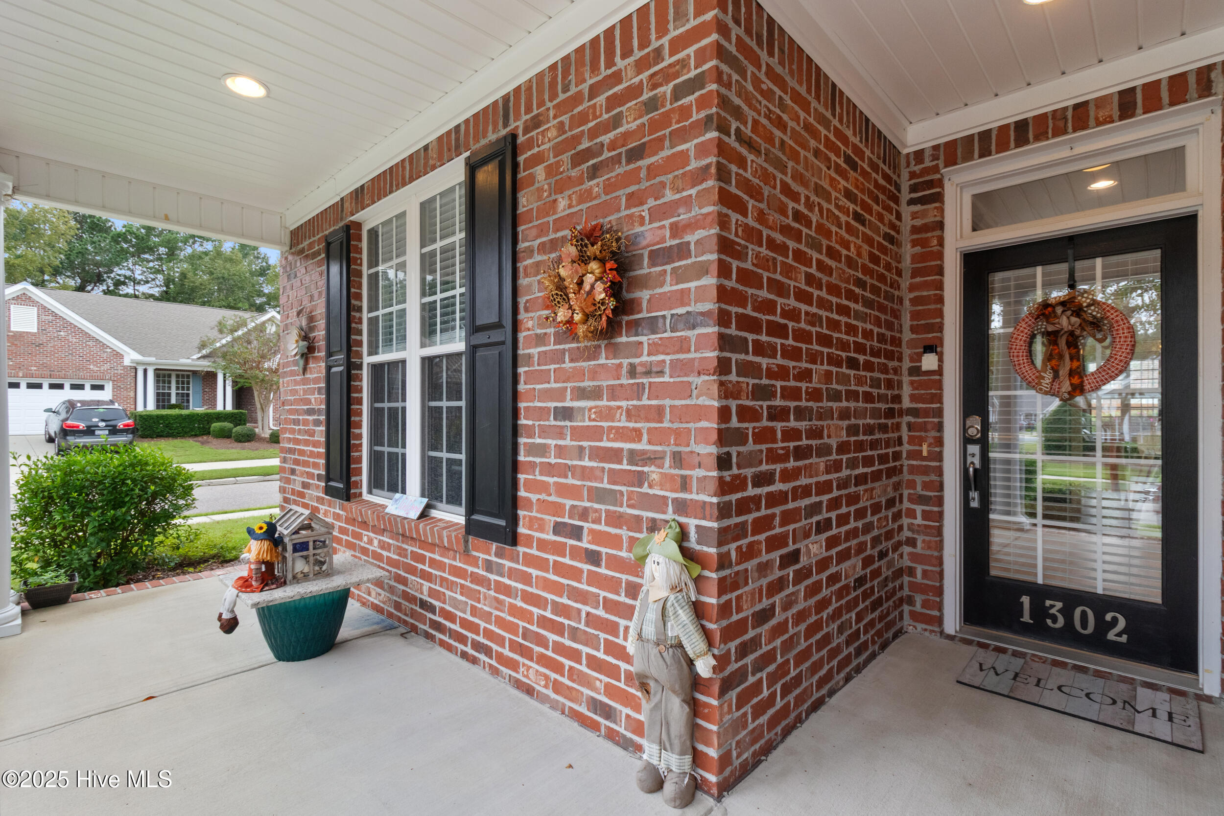 1302 Arbor Ridge Way Leland, NC 28451 - Photo 5 of 52 9_front entryway