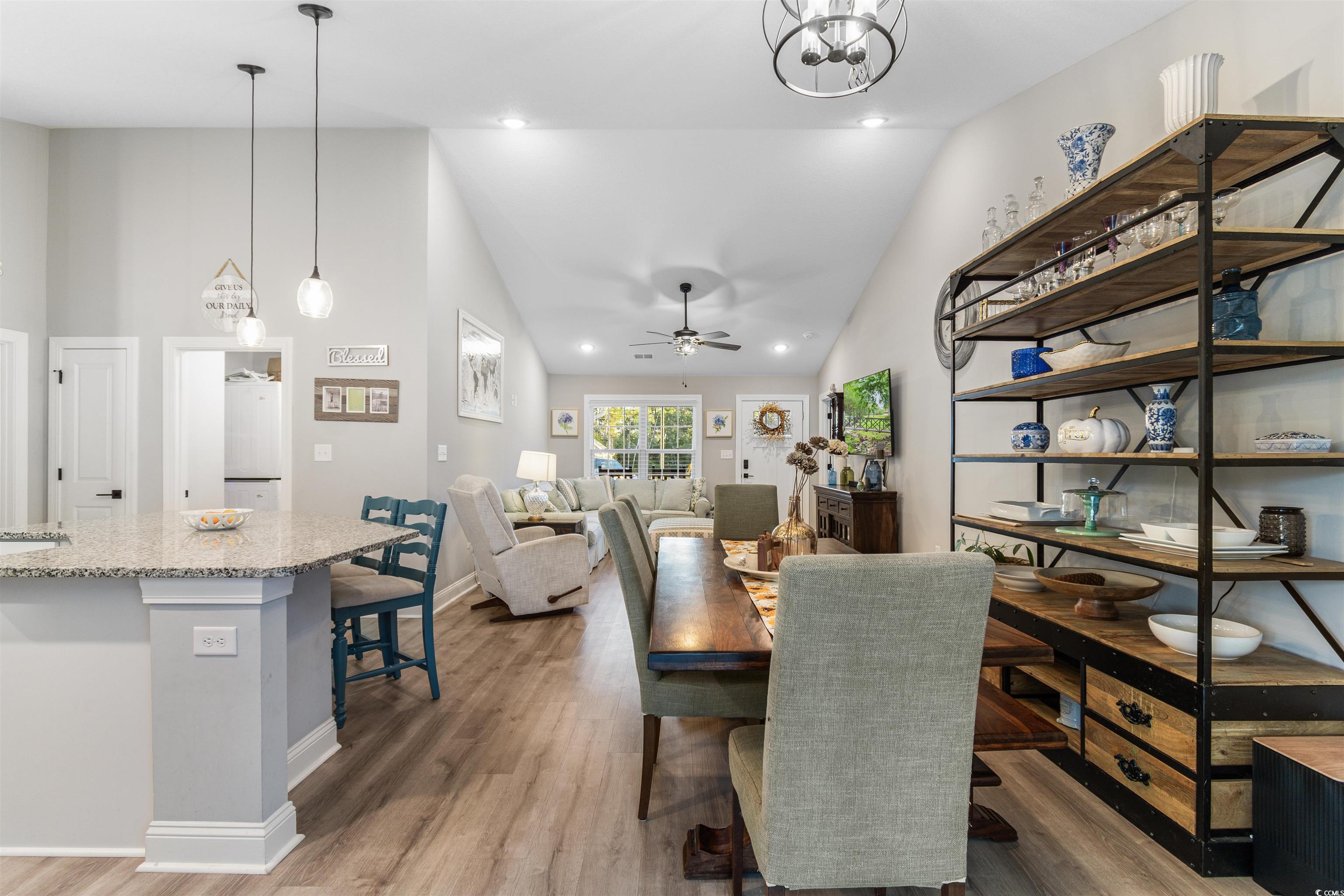 2279 Vaught Road Galivants Ferry, SC 29544 - Photo 14 of 40 Dining space featuring lofted ceiling, dark wood-t