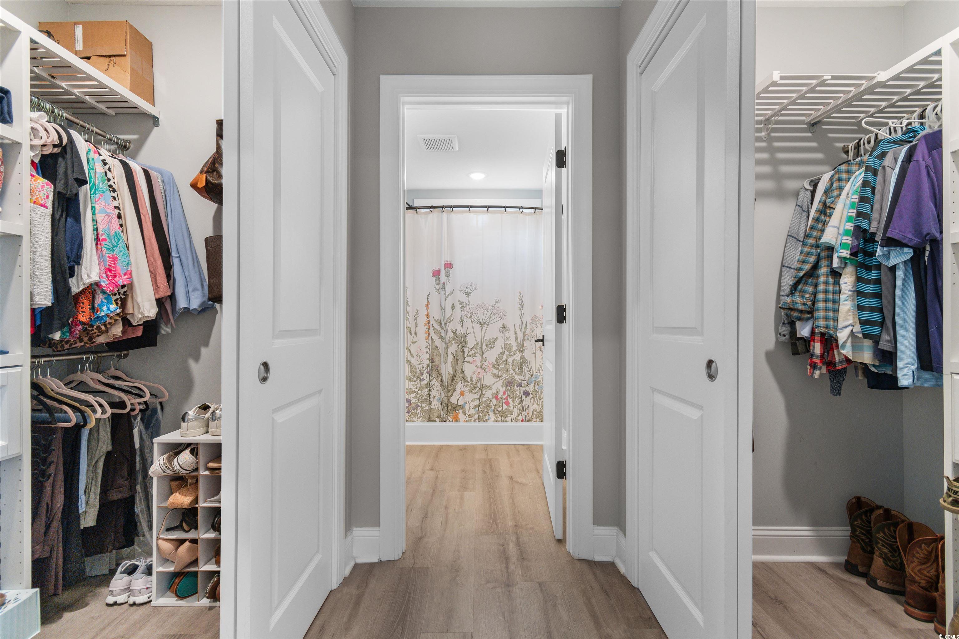 2279 Vaught Road Galivants Ferry, SC 29544 - Photo 18 of 40 Walk in closet with light hardwood / wood-style fl
