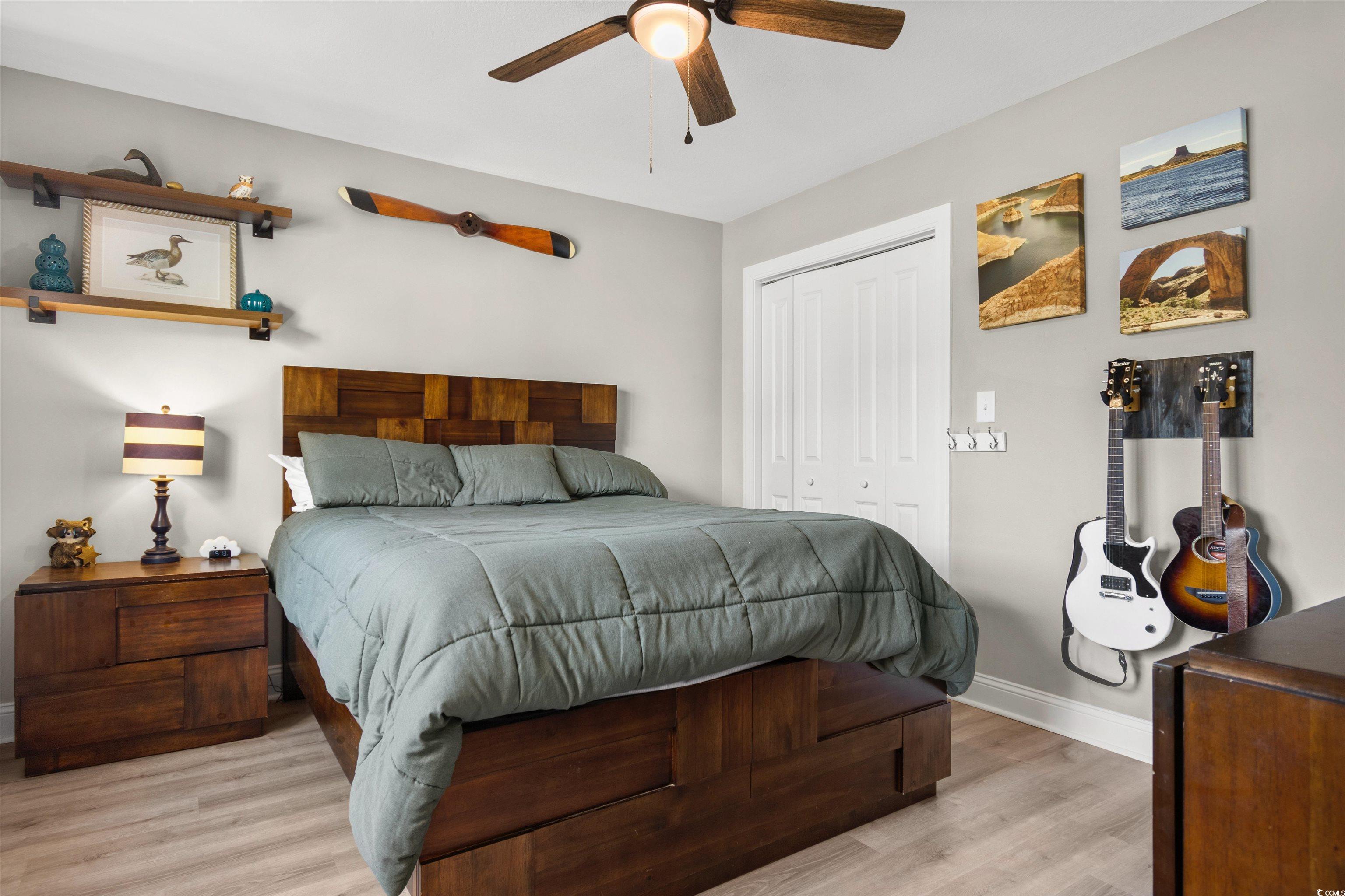 2279 Vaught Road Galivants Ferry, SC 29544 - Photo 22 of 40 Bedroom featuring a closet, light hardwood / wood-
