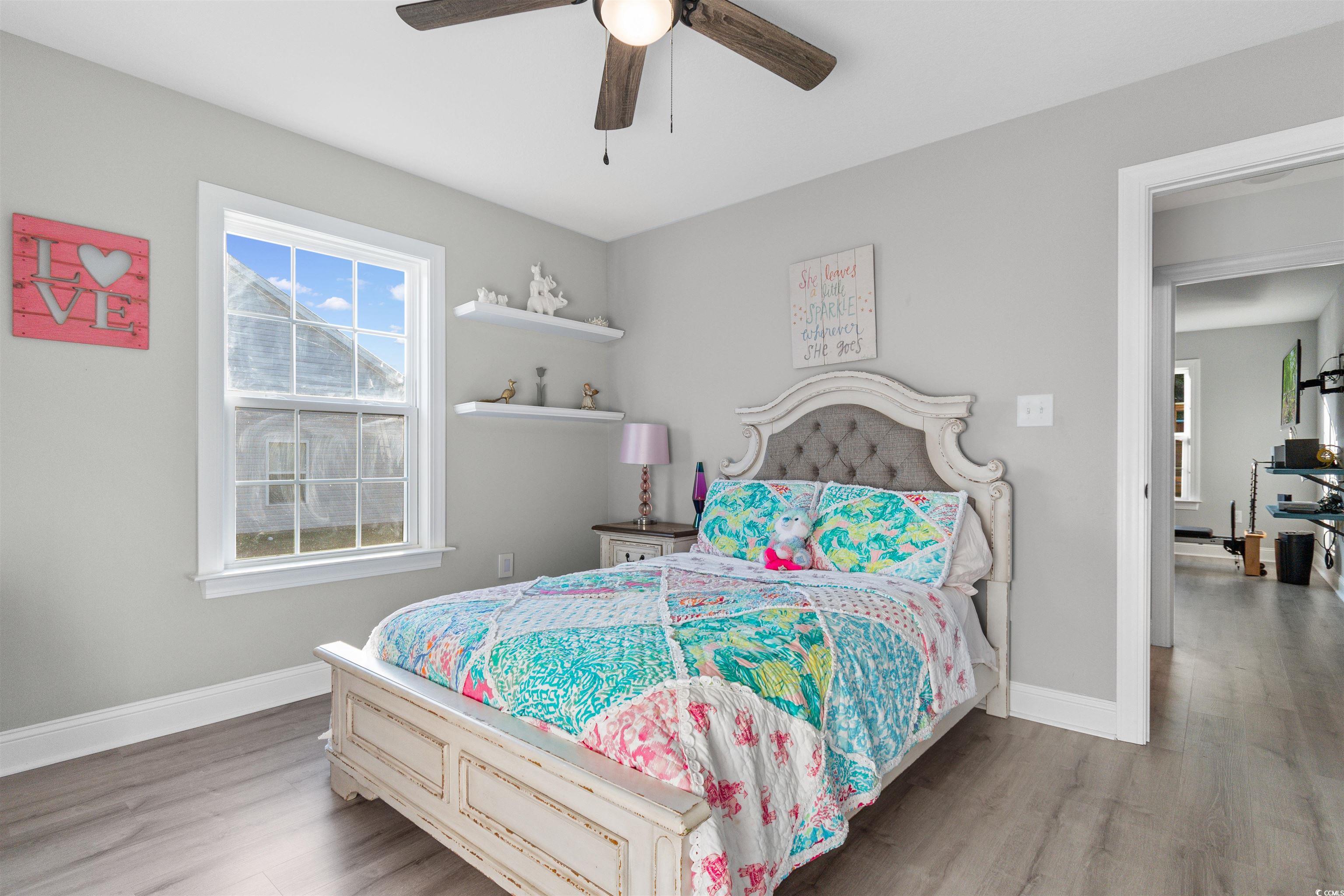 2279 Vaught Road Galivants Ferry, SC 29544 - Photo 24 of 40 Bedroom featuring hardwood / wood-style floors and