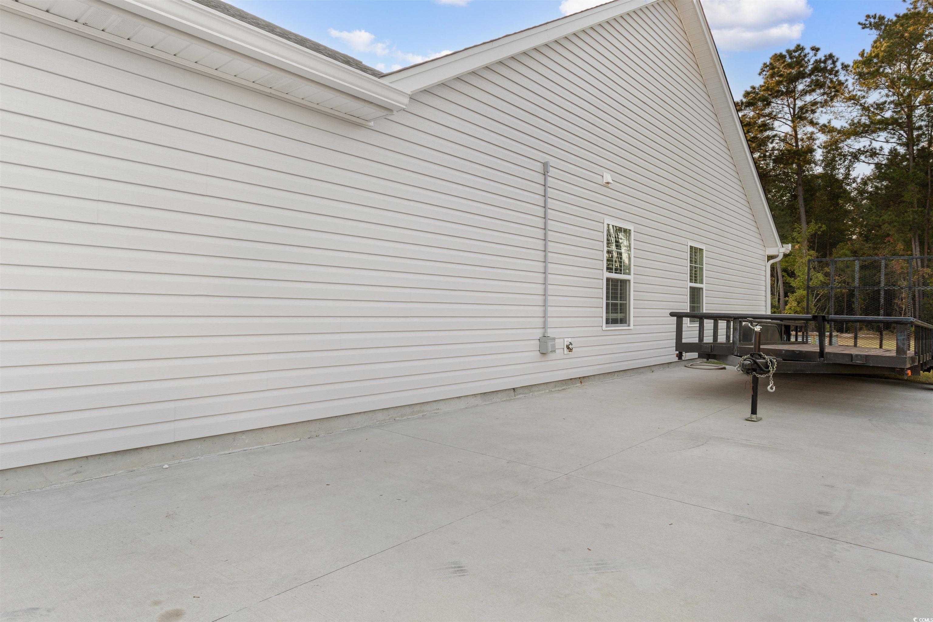 2279 Vaught Road Galivants Ferry, SC 29544 - Photo 29 of 40 View of side of property with a wooden deck