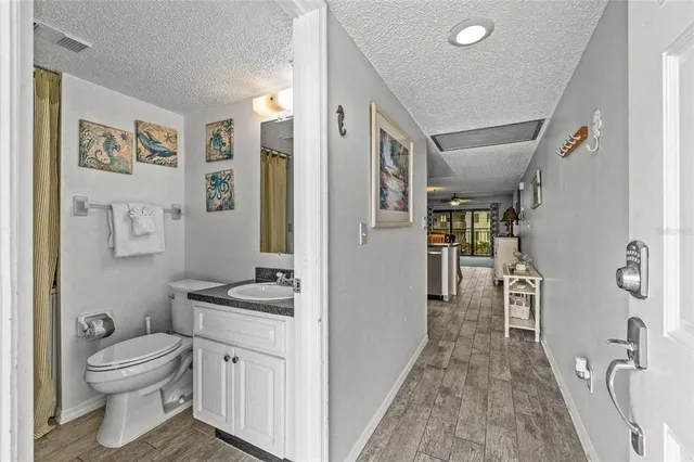 a kitchen with cabinets appliances and a counter space