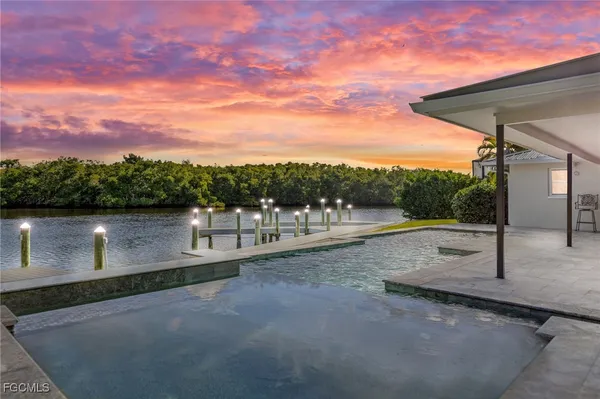 a view of a terrace with a lake view