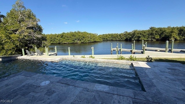 432 Seaworthy Road North Fort Myers, FL 33903 - Photo 2 of 7 a swimming pool with outdoor seating and yard