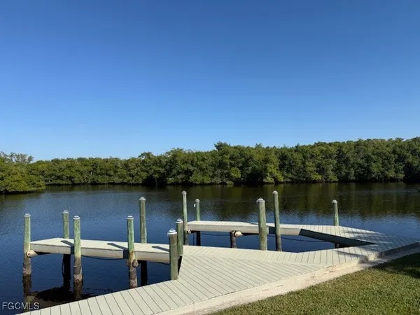 a view of a backyard with patio