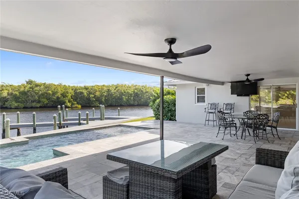 an aerial view of a city with lawn chairs