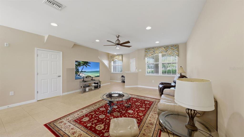 177 Navigation Circle Osprey, FL 34229 - Photo 13 of 43 a living room with furniture and a rug
