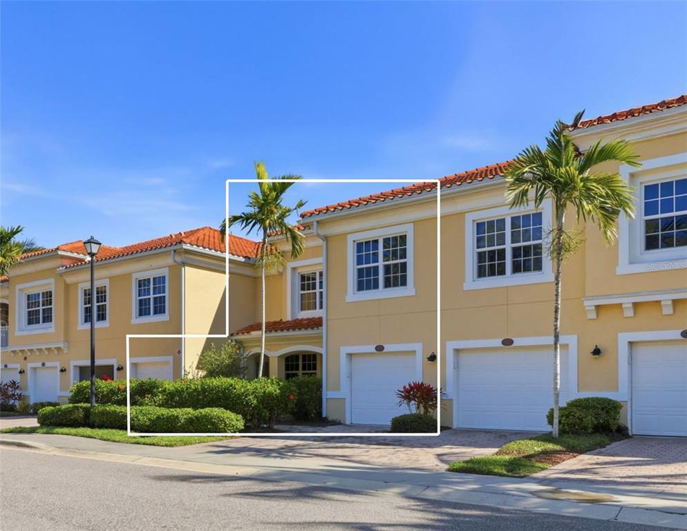 177 Navigation Circle Osprey, FL 34229 - Photo 2 of 43 a front view of a house with a yard
