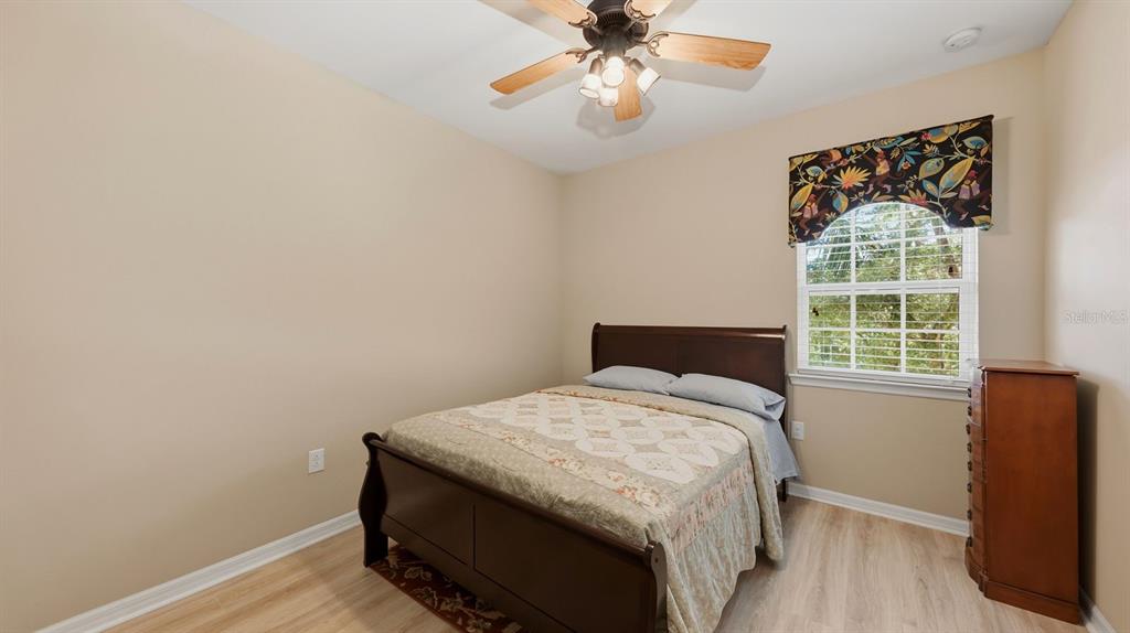 177 Navigation Circle Osprey, FL 34229 - Photo 21 of 43 a bedroom with a bed and a window