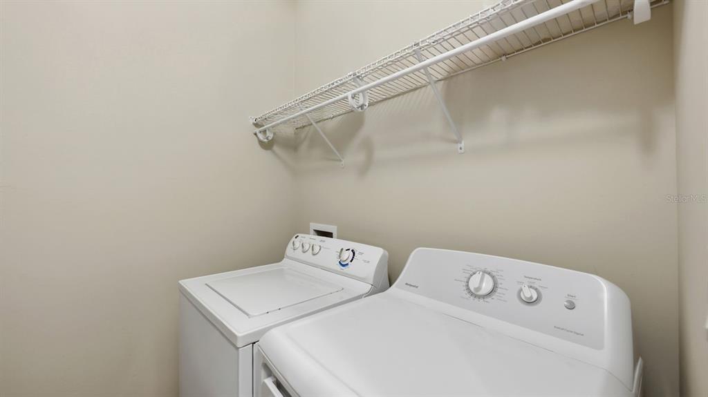 177 Navigation Circle Osprey, FL 34229 - Photo 26 of 43 a utility room with dryer and washer