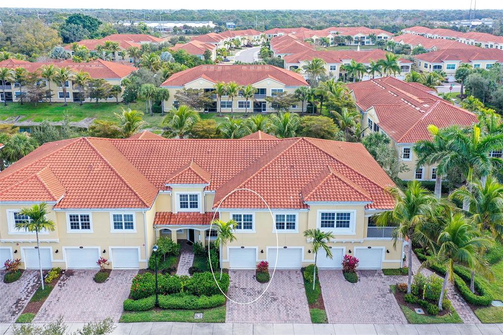 177 Navigation Circle Osprey, FL 34229 - Photo 3 of 43 an aerial view of house with yard and lake view