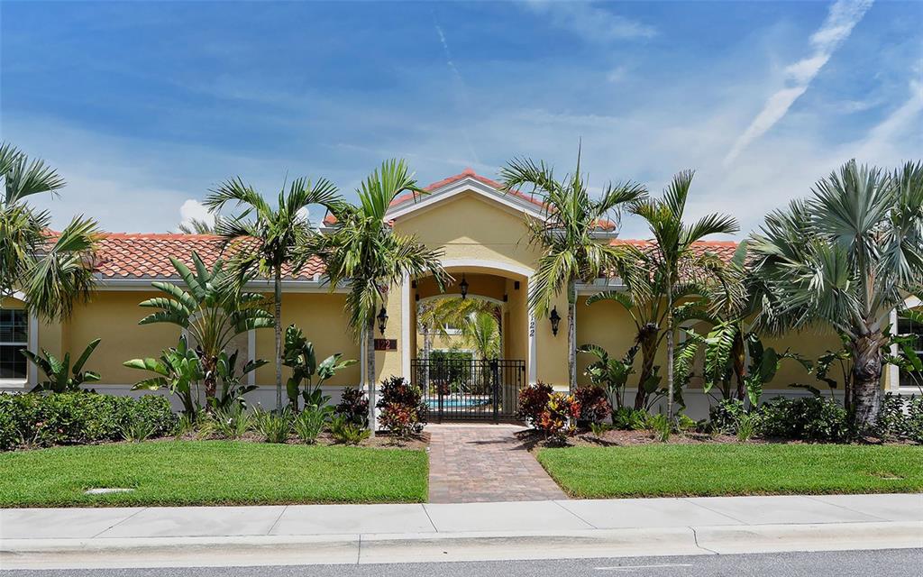 177 Navigation Circle Osprey, FL 34229 - Photo 33 of 43 a view of a house with a yard and potted plants