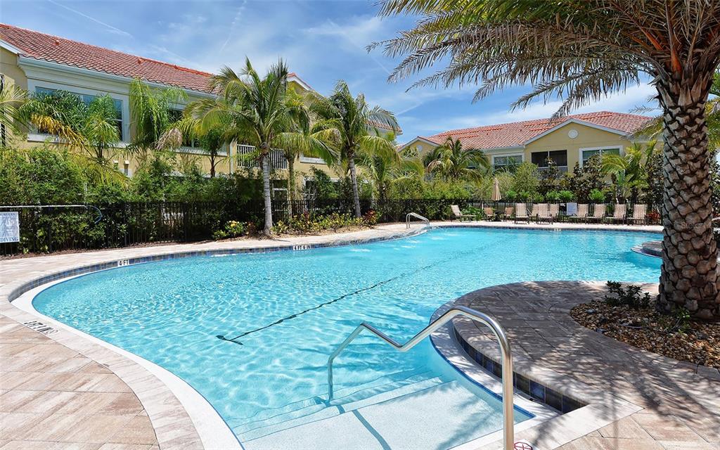 177 Navigation Circle Osprey, FL 34229 - Photo 34 of 43 a view of a swimming pool with a patio and a yard