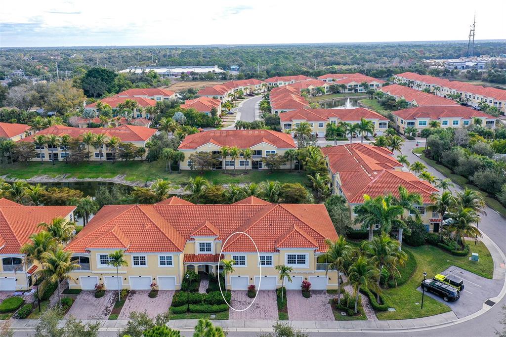 177 Navigation Circle Osprey, FL 34229 - Photo 4 of 43 an aerial view of a house with a garden